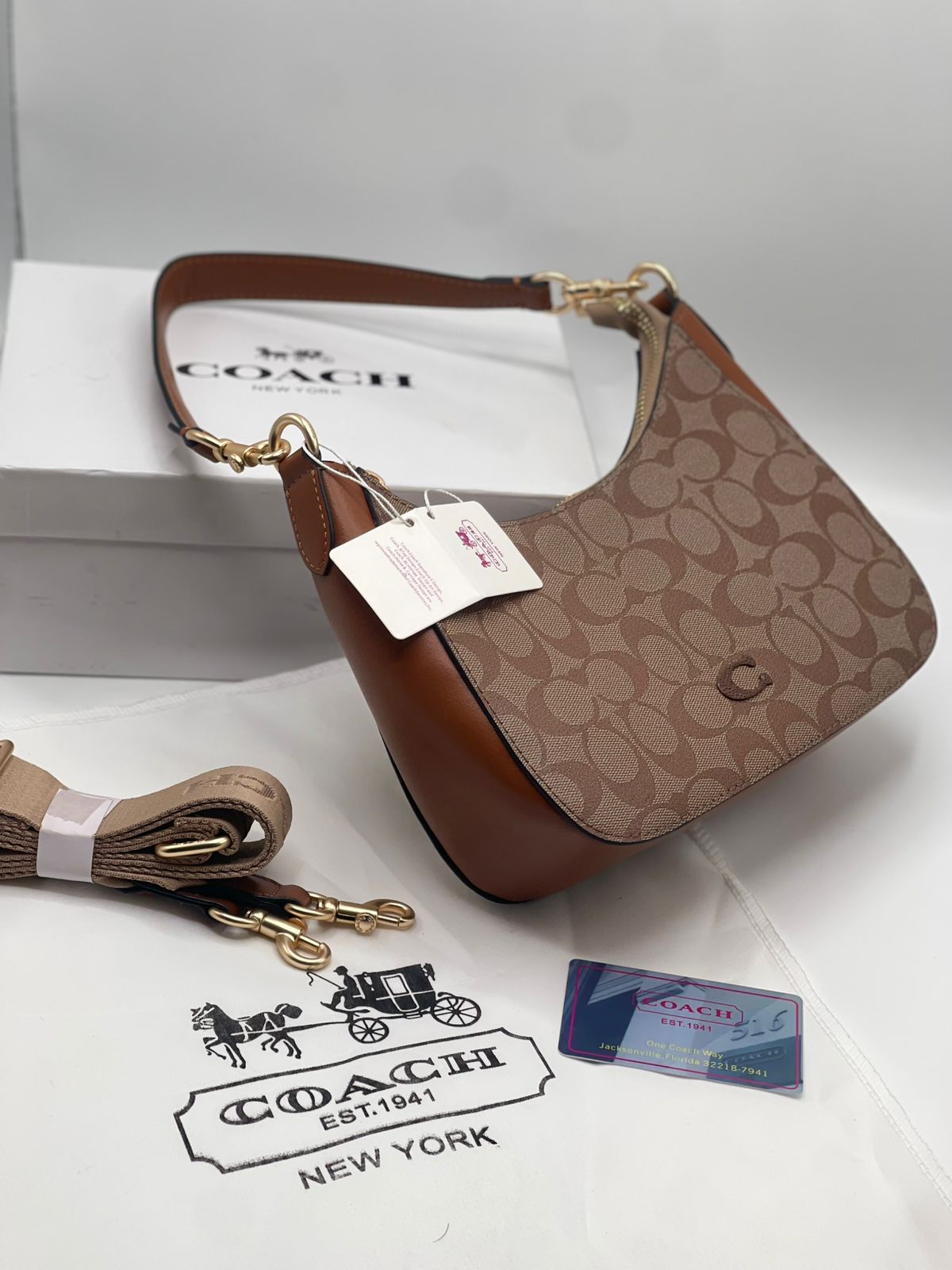 Teri Hobo Bag In Signature Canvas - Coach