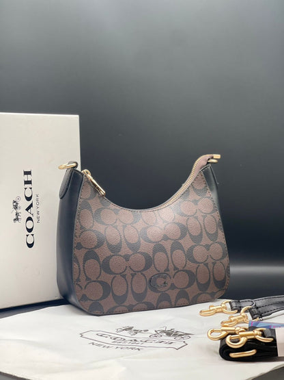 Teri Hobo Bag In Signature Canvas - Coach